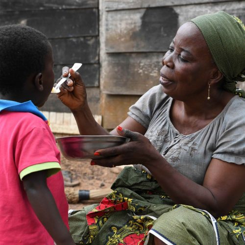 Kemong Djeke, a 62 years old woman is taking care of her grandchild Chris. 
His mother died by giving birth. The little boy was always sick and very slim the first months. Unfortunately he was declared HIV positive. Since his birth, the father, also seropositive, left the baby with his mother, and never went back. 
The grandmother went to the hospital, asked all the information and started the treatment. The boy is getting well now. 
"My advice to all fathers and mothers is to take responsibility and take care for the children, because not all grandmothers an do what I do." says the woman. 
"I hope he becomes someone important." continues the woman. 
In a few months Chris will start going to school 

For every child, a HIV free life.  

(RELEASE OBTAINED)